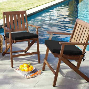 Two folding chairs placed by the outdoor pool hold idee-home Black Outdoor Chair Cushions